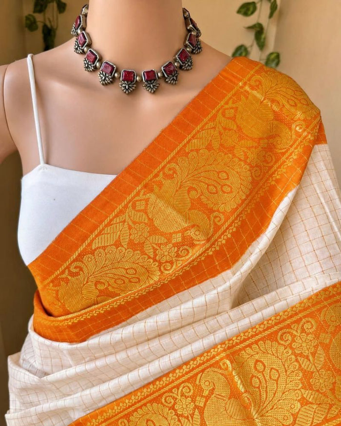 Women’s White & Orange Saree with Golden Paisley Woven Border