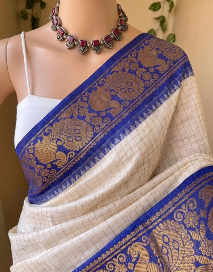 Women’s White & Blue Saree with Golden Paisley Woven Border